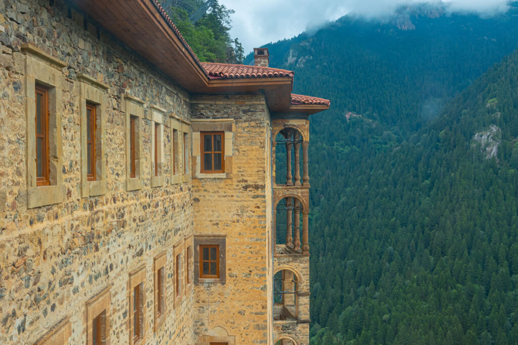 Detailed frescoes inside Sumela Monastery depicting biblical scenes in vibrant colours.