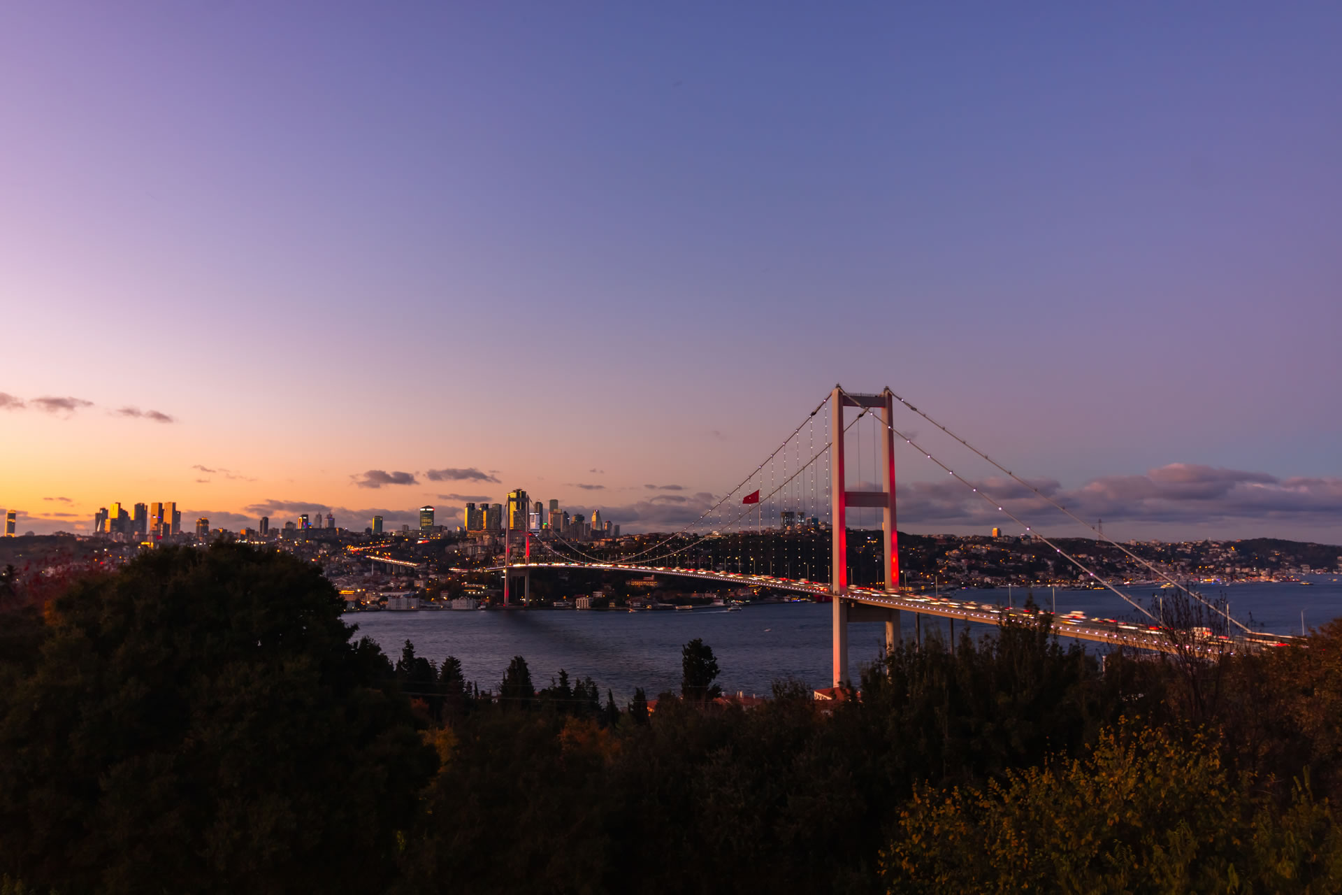 Sunset view over the Bosphorus Bridge in Istanbul, Turkiye.